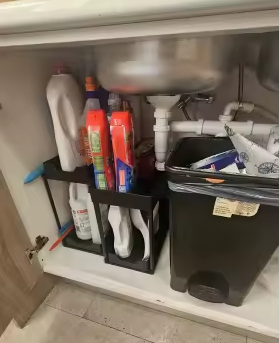 Pull out organiser installed under a sink